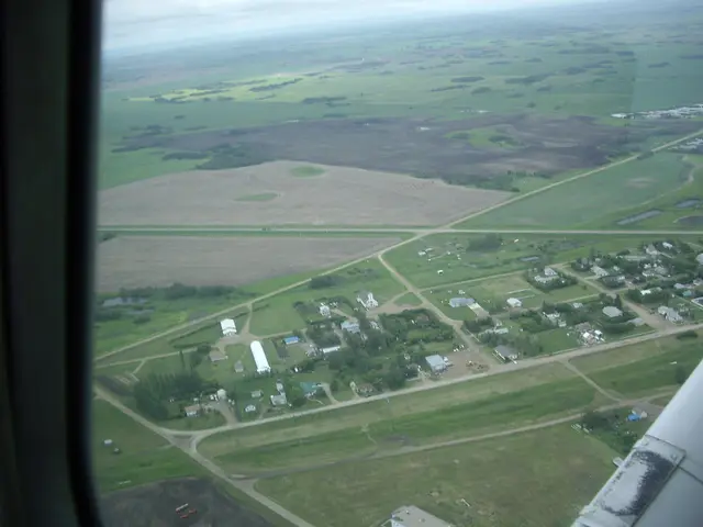 Aerial view of the village and surrounding farmland